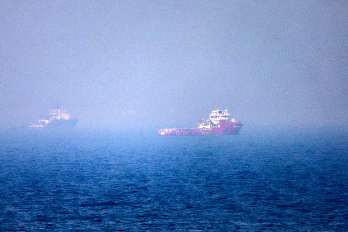 Ships sail near the Strait of Hormuz off the eastern coast of the United Arab Emirates at Khor Fakkan on July 13, 2026. (AFP via Getty Images)