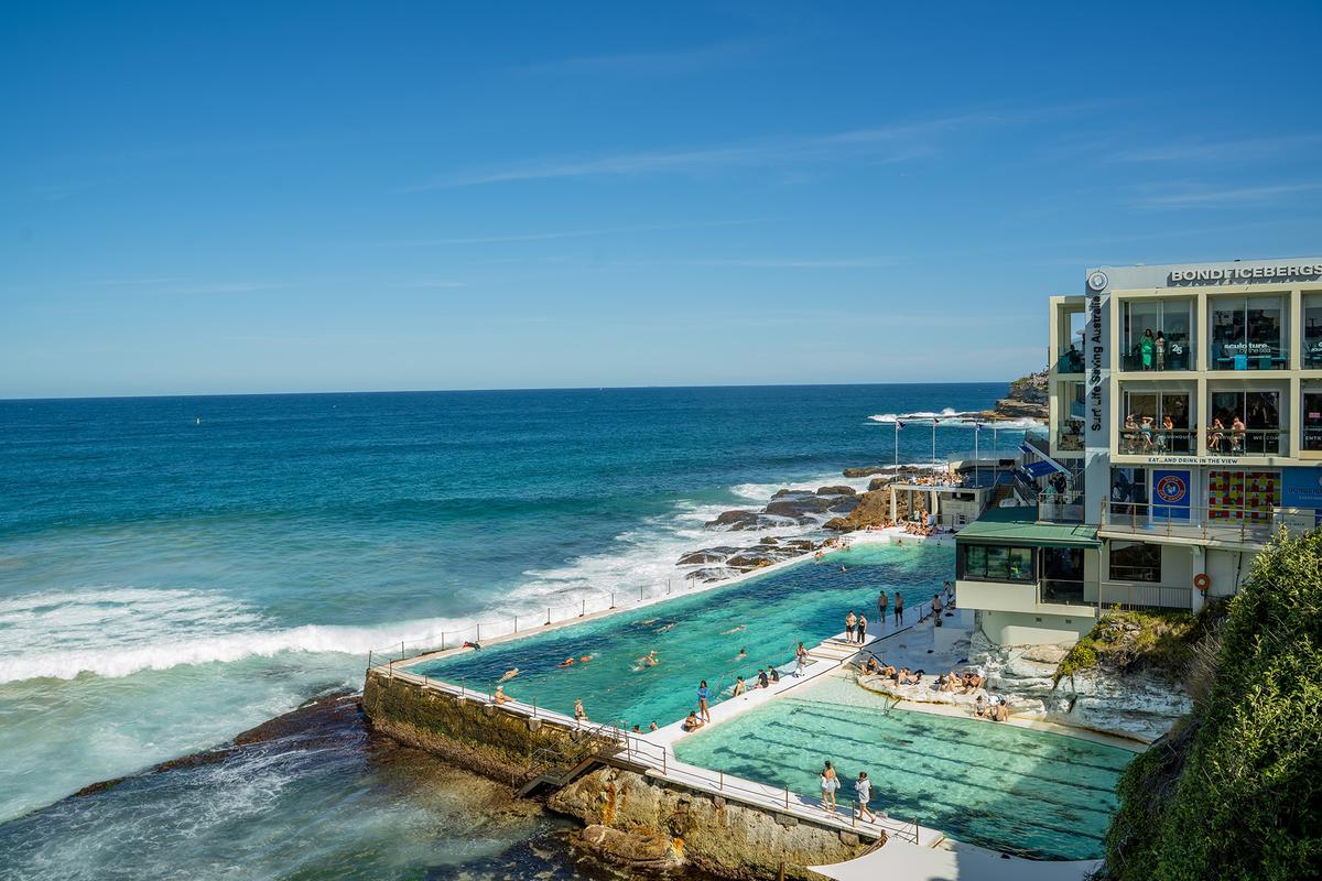 Waves from the Pacific Ocean wash into Bondi Icebergs Pool on Bondi Beach, filling the pool with saltwater. The Icebergs Club has been associated with winter ocean swimming since 1929. (Sasanan Trakansuebkul/Shutterstock)