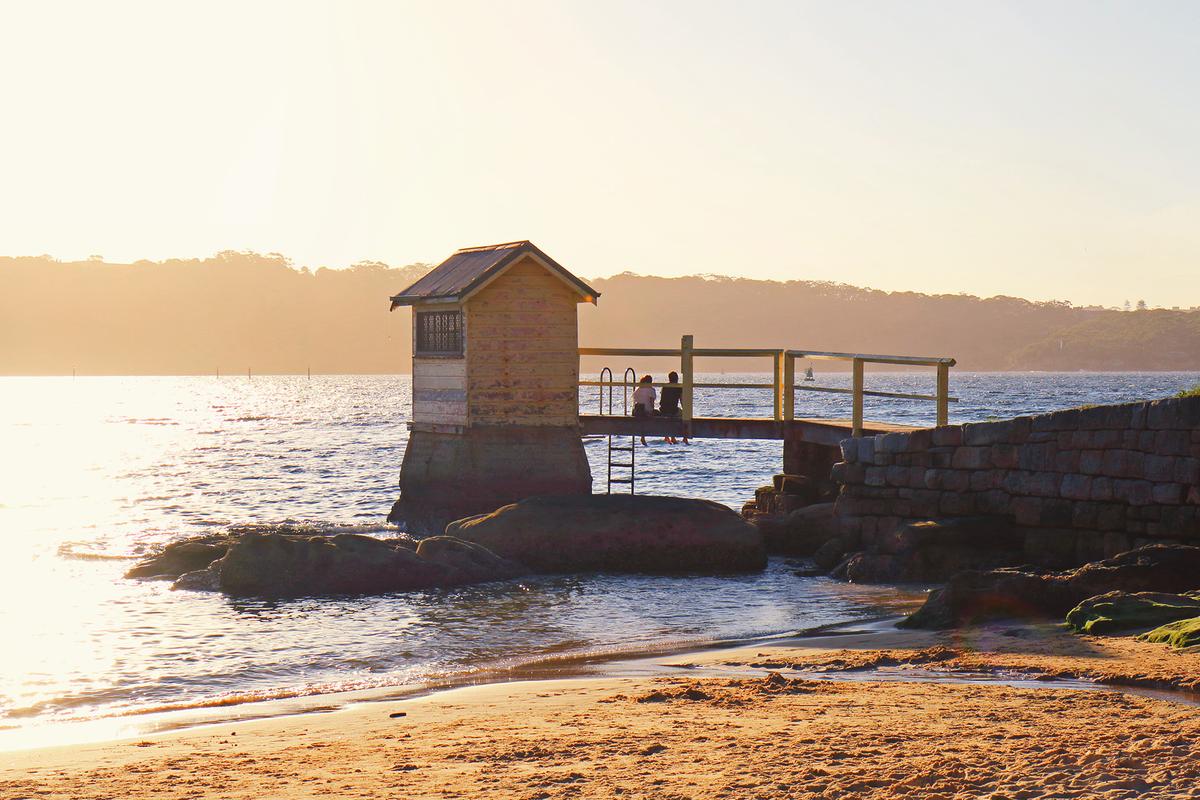 Sunset falls over Camp Cove, a sheltered beach located near the entrance of Sydney Harbour. The cove was one of the first landing places used by the First Fleet in 1788. (aiyoshi597/Shutterstock)