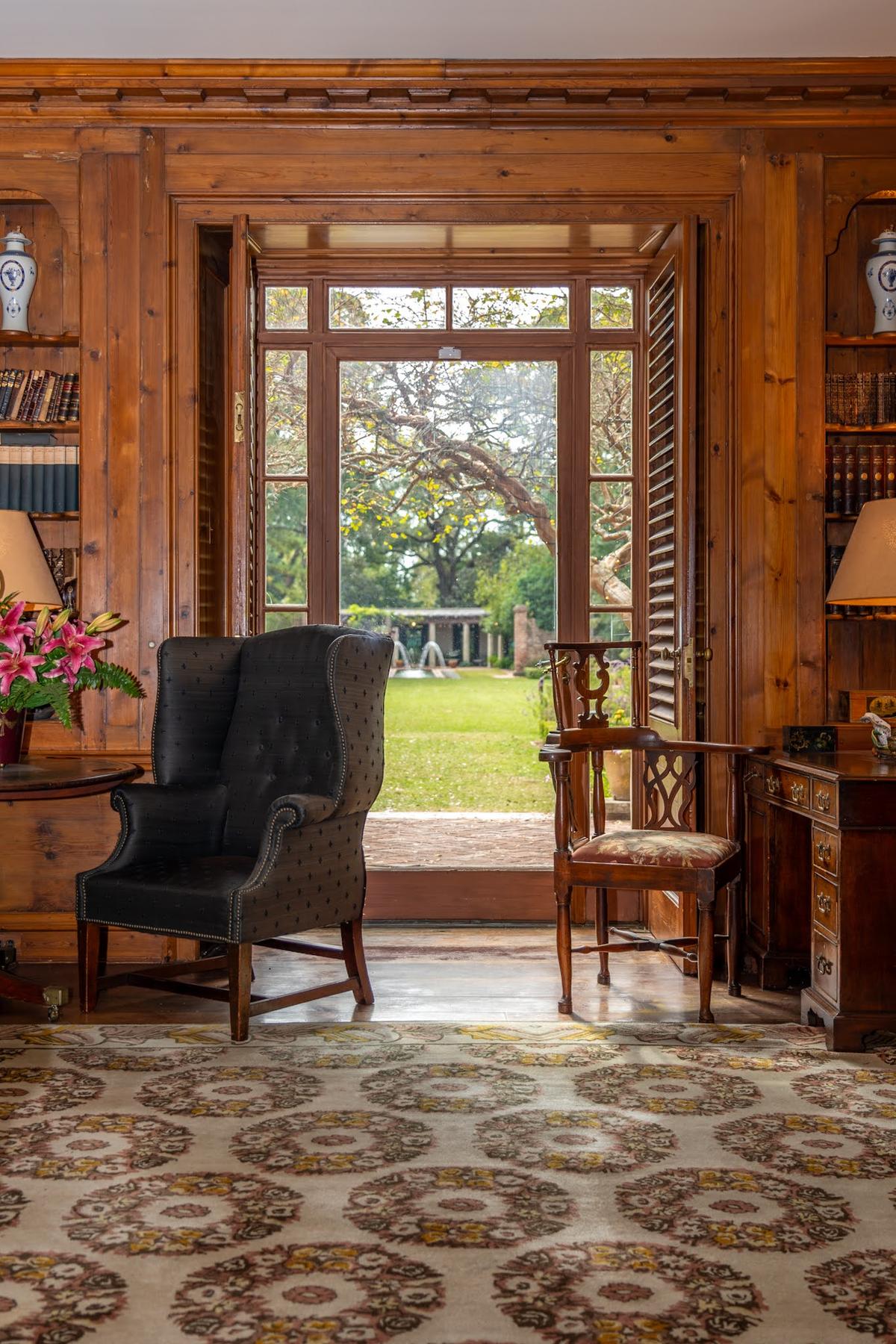 The Library at Longue Vue House is a formal yet intimate space designed for reading, conversation, and study. Its walls are crafted from imported antique Norwegian spruce, complemented by custom woodwork and built-in bookcases. Edith Stern’s desk remains in the room, where she worked on projects including the founding of the Country Day School, which continues to operate in New Orleans. (Longue Vue House and Gardens)