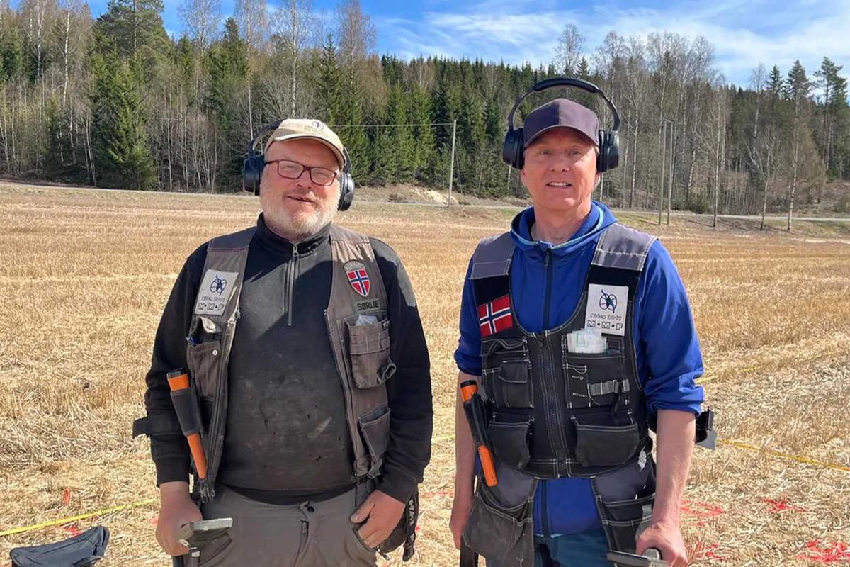 Vegard Sørlie (L) and Rune Sætre, the detectorists who found the Mørstad Hoard, Norway’s largest coin cache from the Viking Age. (Innlandet County Authority)
