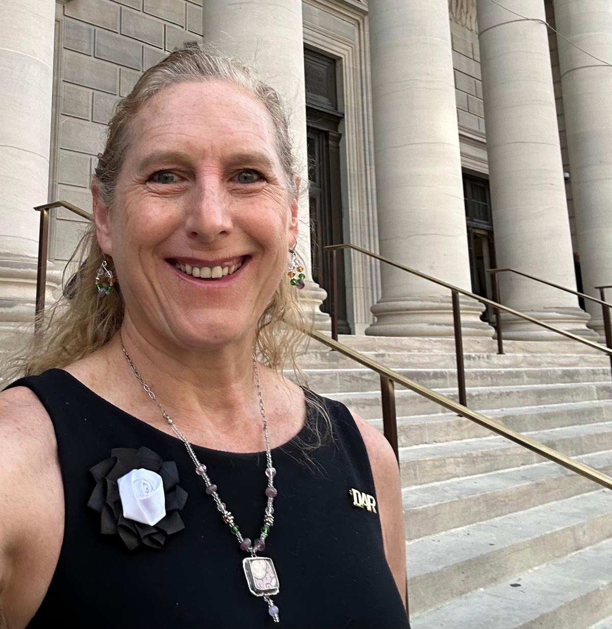 Heidi Weidamann, 63, of Cincinnati, takes a selfie outside the Daughters of the American Revolution headquarters in Washington on June 25, 2026. (Courtesy of Heidi Weidamann)