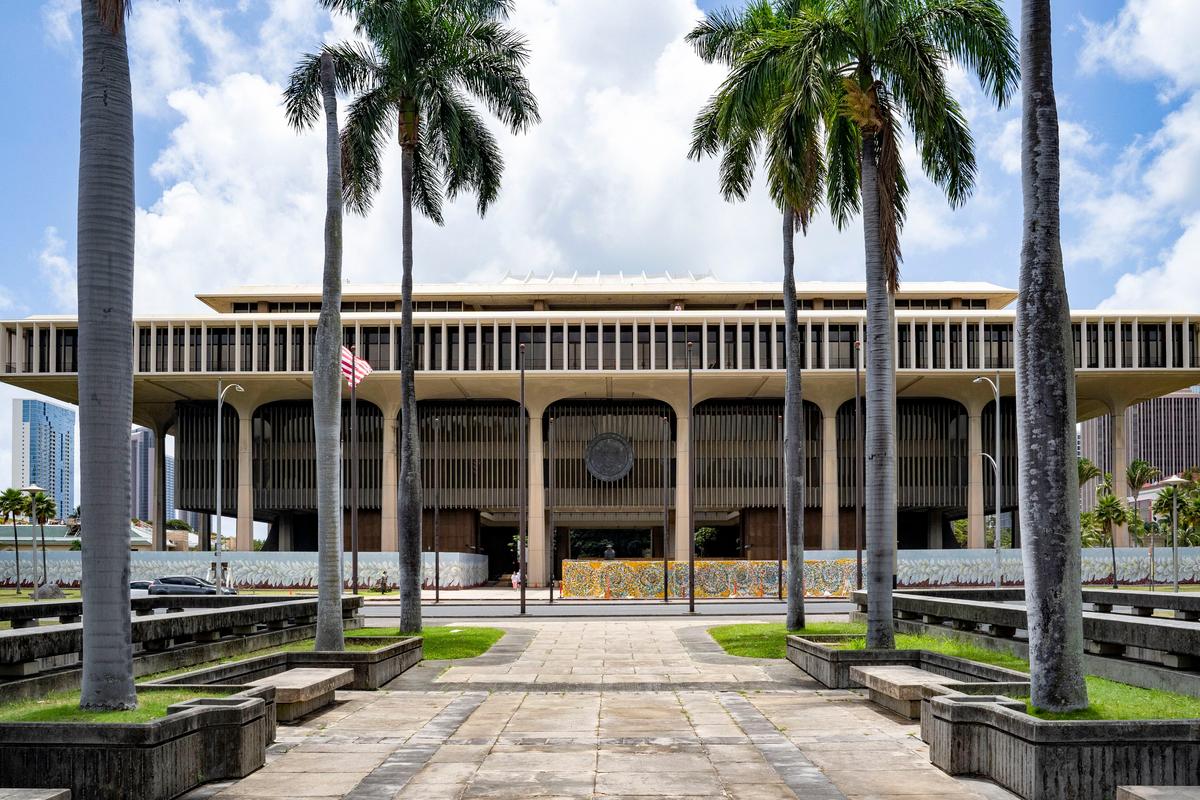 Palm trees frame the Hawaii State Capitol in Honolulu, Hawaii, on April 23, 2025. (AP Photo/Mengshin Lin, File)