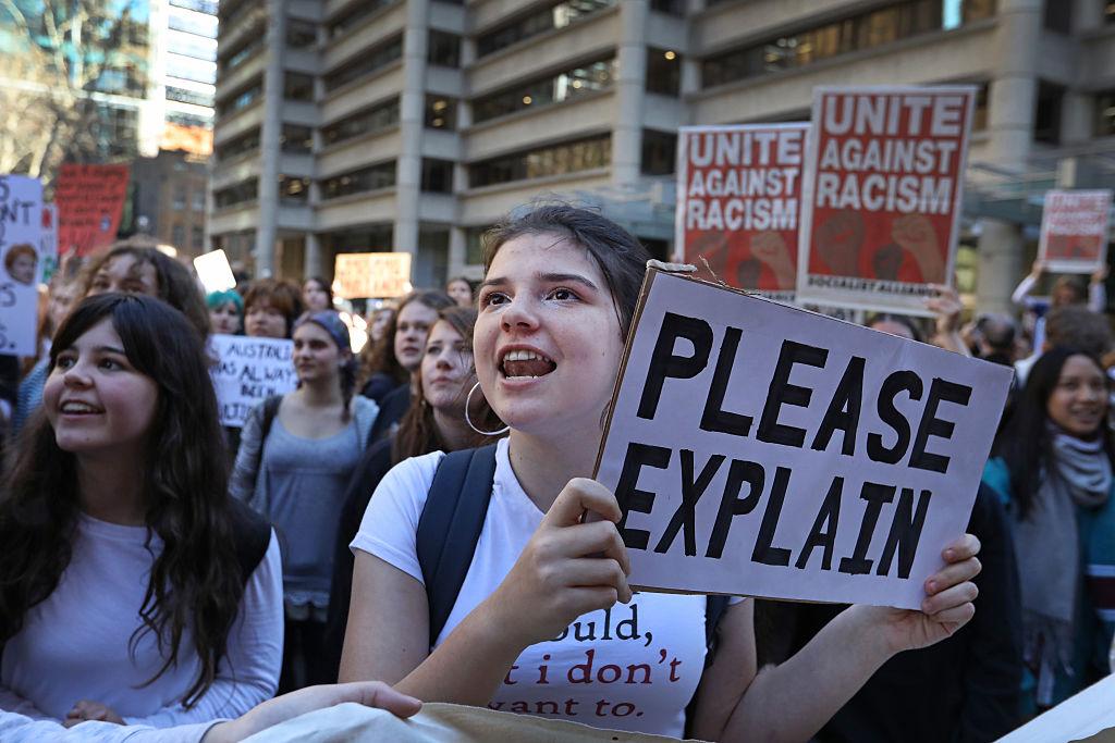 Student protesters hold placards and chant during a "Students Say No To Hanson" National Protest Day at Town Hall in Sydney, Australia on Aug. 13, 2026. (Lisa Maree Williams/Getty Images)