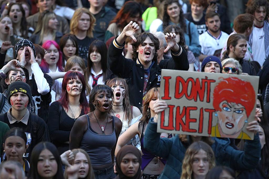 Student protesters hold placards and chant during a "Students Say No To Hanson" National Protest Day at Town Hall in Sydney, Australia on Aug. 13, 2026. (Lisa Maree Williams/Getty Images)