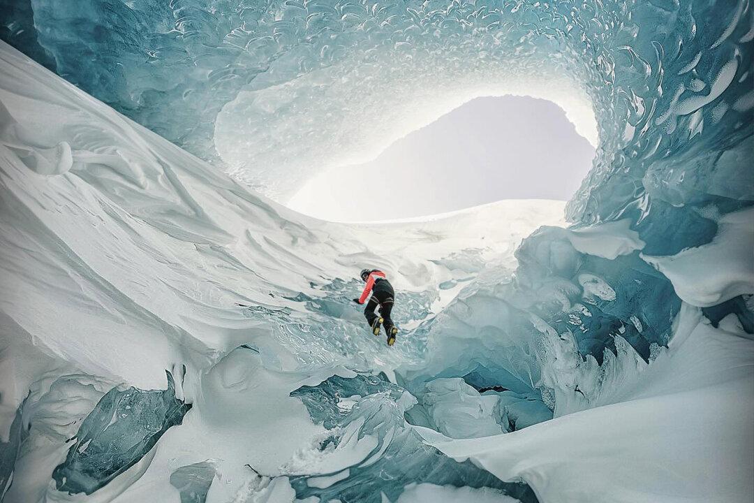 ‘Another World’: Photographer Explores Giant Ice Caves in the Belly of a Glacier—And The Photos Are Surreal