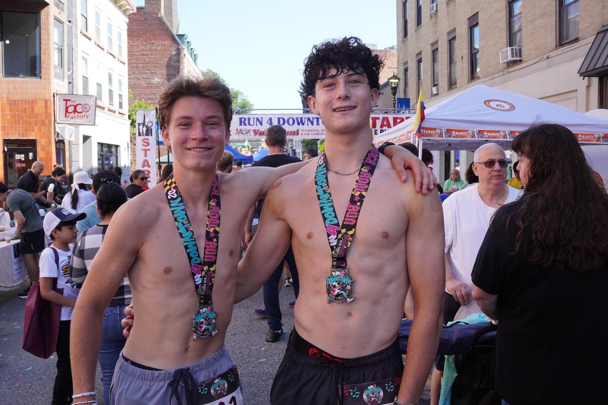 Rylan Young (L) and Sebastian Rudnick (R) at the 20th Run 4 Downtown on North Street in Middletown, N.Y., on Aug. 15, 2026. (Oliver Mantyk/The Epoch Times)