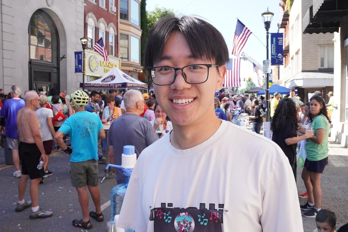 Ray Feng at the 20th Run 4 Downtown on North Street in Middletown, N.Y., on Aug. 15, 2026. (Oliver Mantyk/The Epoch Times)