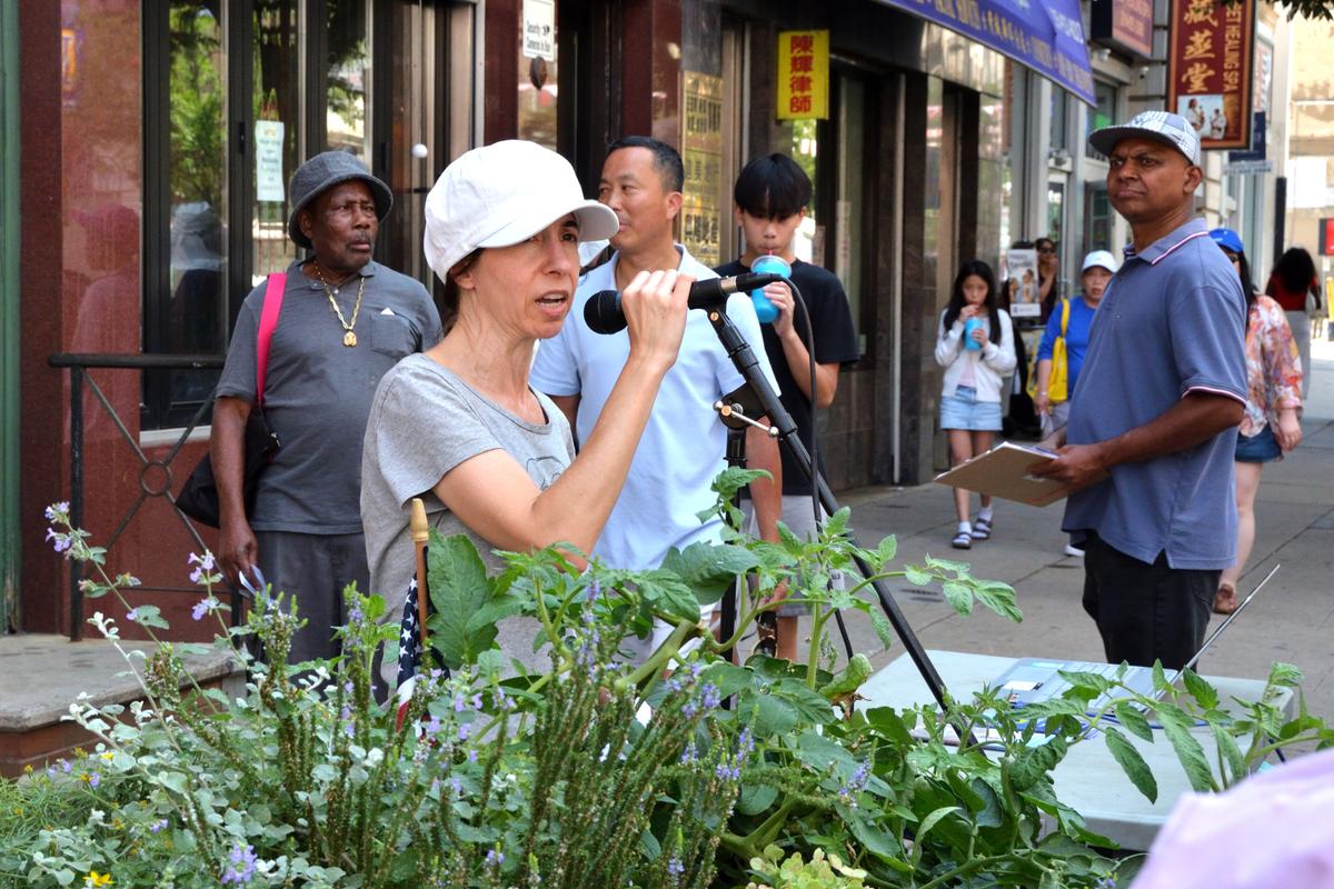Dr. Jessica Russo, a representative of Doctors Against Forced Organ Harvesting, speaks at the rally in Philadelphia on Aug. 15, 2026. (Frank Liang/The Epoch Times)