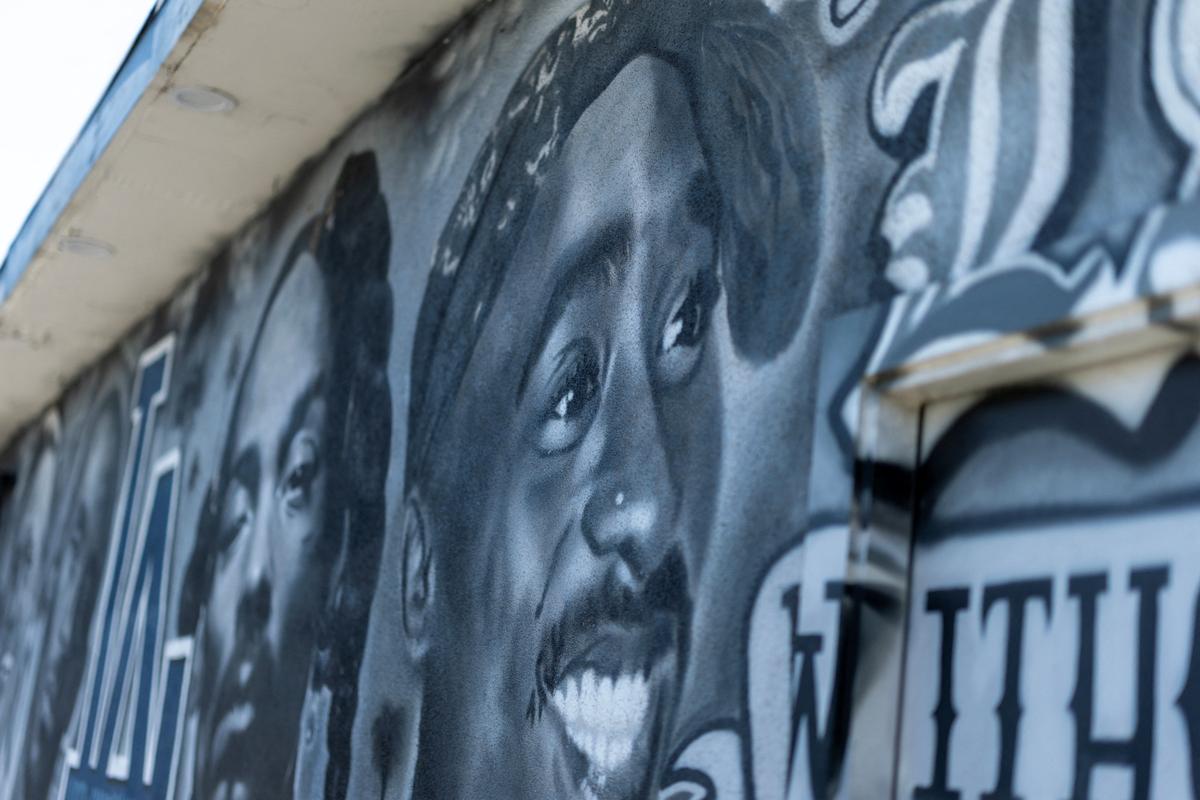A mural depicting the late rapper Tupac Shakur on the side of a building in Bellflower, Calif., on Aug. 10, 2026. (Mike Blake/Reuters)