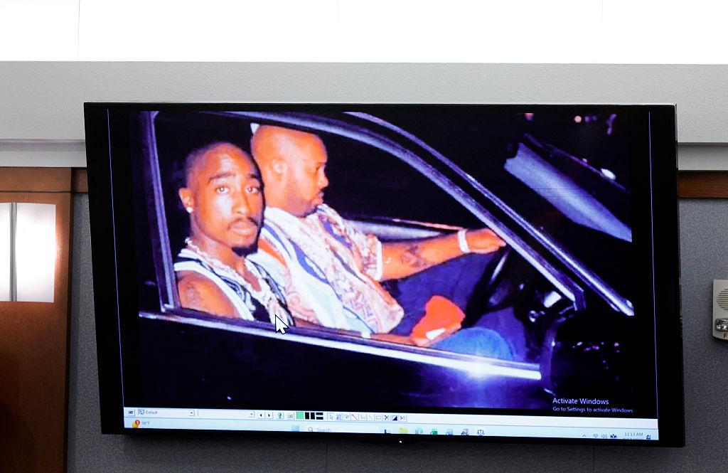 A 1996 photo of rapper Tupac Shakur (L) and Marion "Suge" Knight is displayed during the Duane Davis murder trial, related to the 1996 killing of the rapper, at Clark County District Court at the Regional Justice Center in Las Vegas, Nevada, on August 17, 2026. (Steve Marcus/AFP via Getty Images)
