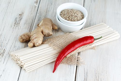 Stimulating the metabolism with warming smoothie additions like cayenne and ginger (<a href="http://www.shutterstock.com/pic-101254585/stock-photo-still-life-with-udon-noodles-ginger-sesame-seed-and-chili-pepper.html?src=zTRlGJZFd-klD5K296YMVA-1-2&ws=1" target="_blank">Shutterstock</a>)