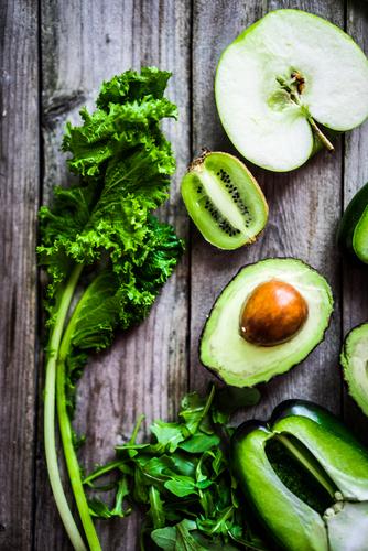 Adding in whole foods that have natural anti-inflammatory properties will make the cleanse program delicious! (<a href="http://www.shutterstock.com/pic-241279108/stock-photo-mix-of-green-vegetables-and-fruits-on-rustic-background.html?src=PI4kEJFZE8SpSJXebmaB_Q-1-2" target="_blank">Shutterstock</a>)