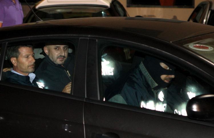 <a><img src="https://www.theepochtimes.com/assets/uploads/2015/09/105982464.jpg" alt="Mafia boss Gerlandino Messina (C) leaves the Italian Carabinieri Headquarters in Villa Seta, Agrigento, Italy on October 23. Messina, who had been on the run for 11 years before being nabbed Saturday by Carabinieri, was one of Italy's 30 most dangerous Mafia fugitives. (Marcello Paternostro/Getty Images )" title="Mafia boss Gerlandino Messina (C) leaves the Italian Carabinieri Headquarters in Villa Seta, Agrigento, Italy on October 23. Messina, who had been on the run for 11 years before being nabbed Saturday by Carabinieri, was one of Italy's 30 most dangerous Mafia fugitives. (Marcello Paternostro/Getty Images )" width="320" class="size-medium wp-image-1812729"/></a>