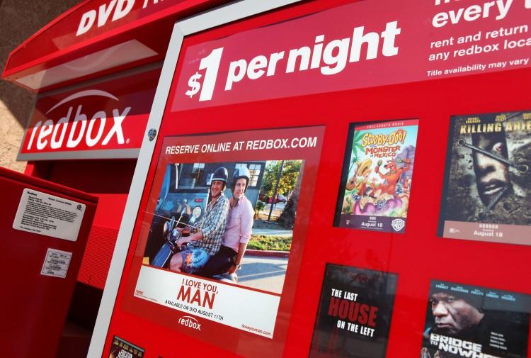 <a><img src="https://www.theepochtimes.com/assets/uploads/2015/09/redbox.jpg" alt="Movie titles are seen displayed on a Redbox DVD rental kiosk in San Rafael, Calif. Coinstar, which owns Redbox, said that it would raise the daily price of a rental from $1 to $1.20. (Justin Sullivan/Getty Images)" title="Movie titles are seen displayed on a Redbox DVD rental kiosk in San Rafael, Calif. Coinstar, which owns Redbox, said that it would raise the daily price of a rental from $1 to $1.20. (Justin Sullivan/Getty Images)" width="575" class="size-medium wp-image-1795585"/></a>