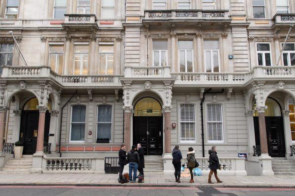 Journalists gather outside the headquarters of Orbis Business Intelligence, the company run by former intelligence officer Christopher Steele, in London on Jan. 12, 2017. (Leon Neal/Getty Images)