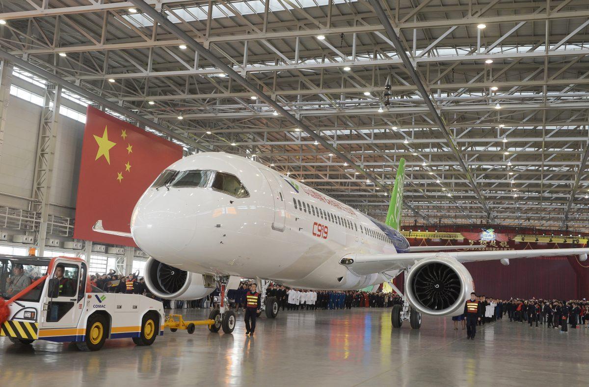 China's first self-developed large passenger jetliner, the C919, is presented after it rolled off the production line at Shanghai Aircraft Manufacturing Co. in Shanghai on Nov. 2, 2015. (VCG/VCG via Getty Images)