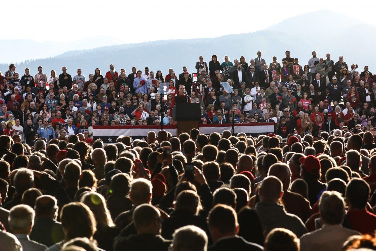 Audience members sing the national anthem at a Make America Great Again rally in Missoula, Montana, on Oct. 18, 2018. (Charlotte Cuthbertson/The Epoch Times)