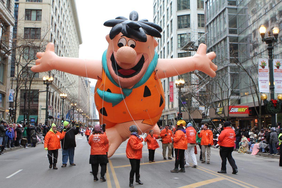 Fred Flintstone makes an appearance on Chicago's State Street. (Lin Chong)