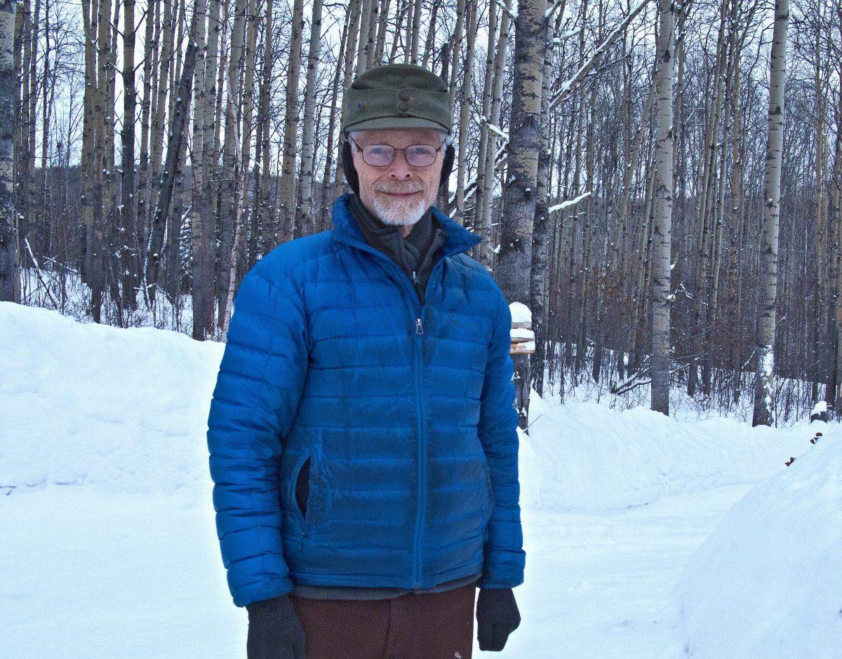 Photographer Douglas A. Yates in front of an aspen forest, near his home in Fairbanks, Alaska on Feb. 16, 2019. (Douglas A. Yates)