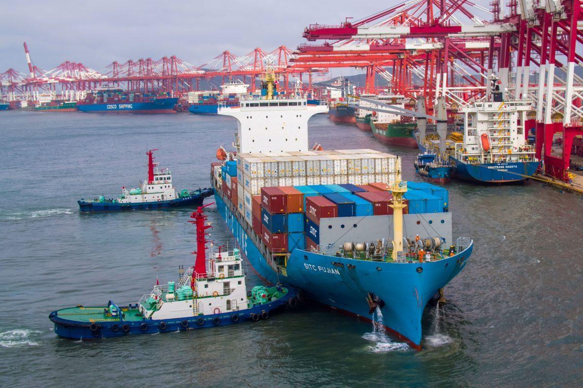 A container ship berthing at the port in Qingdao, Shandong Province, China, on May 17, 2019. (STR/AFP/Getty Images)
