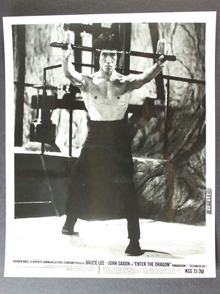 Bruce Lee with nunchaku in the legendary kungfu film "Enter the Dragon." (Warner Bros.)