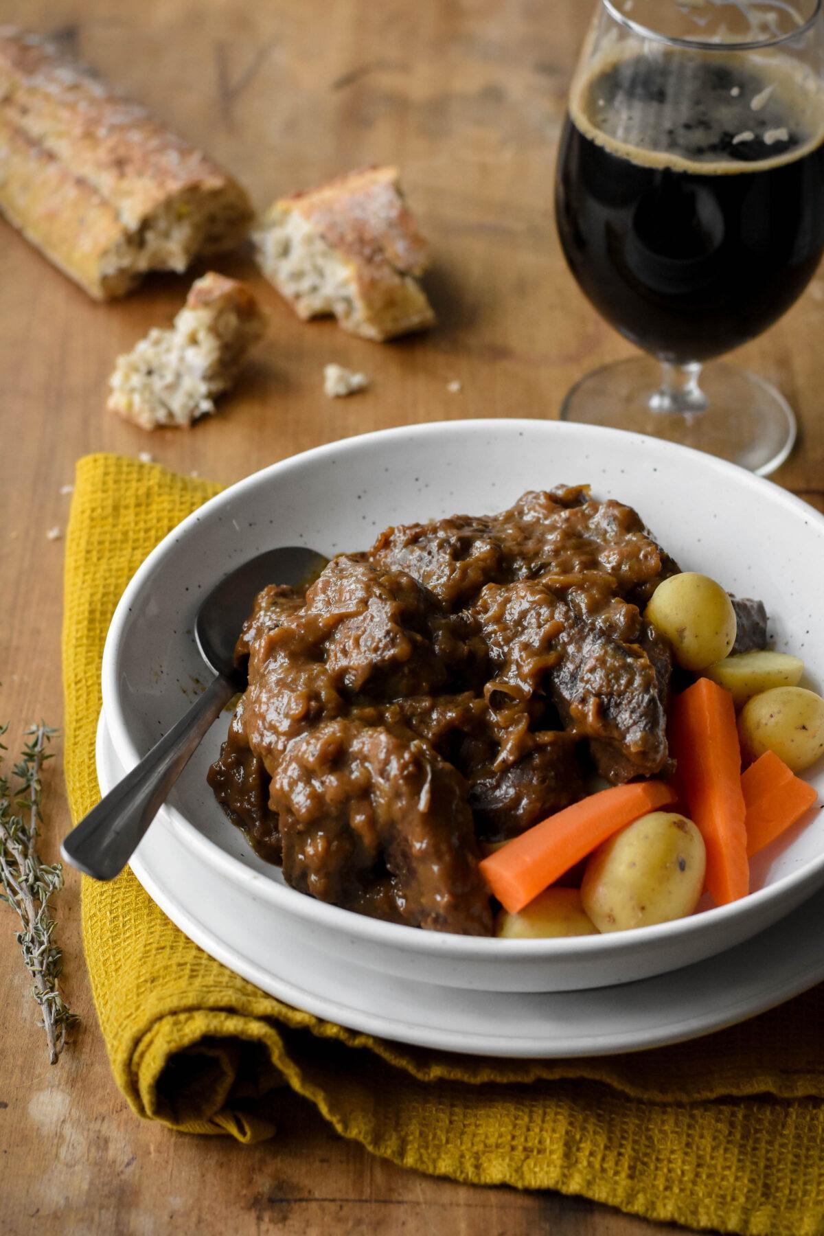 Serve carbonnade with boiled potatoes and carrots, over noodles, or on a mountain of French fries like they usually do in Flanders. (Audrey Le Goff)