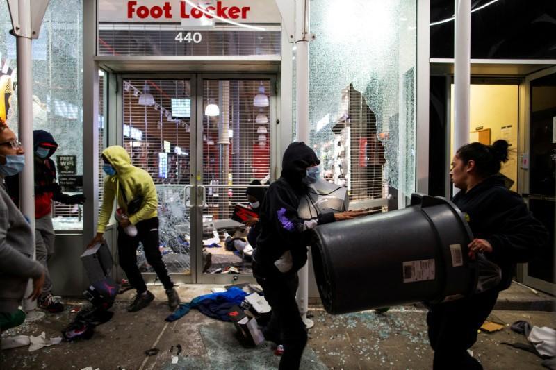 Protesters loot a store in the Manhattan borough of New York City, N.Y. on June 1, 2020. (Eduardo Munoz/Reuters)