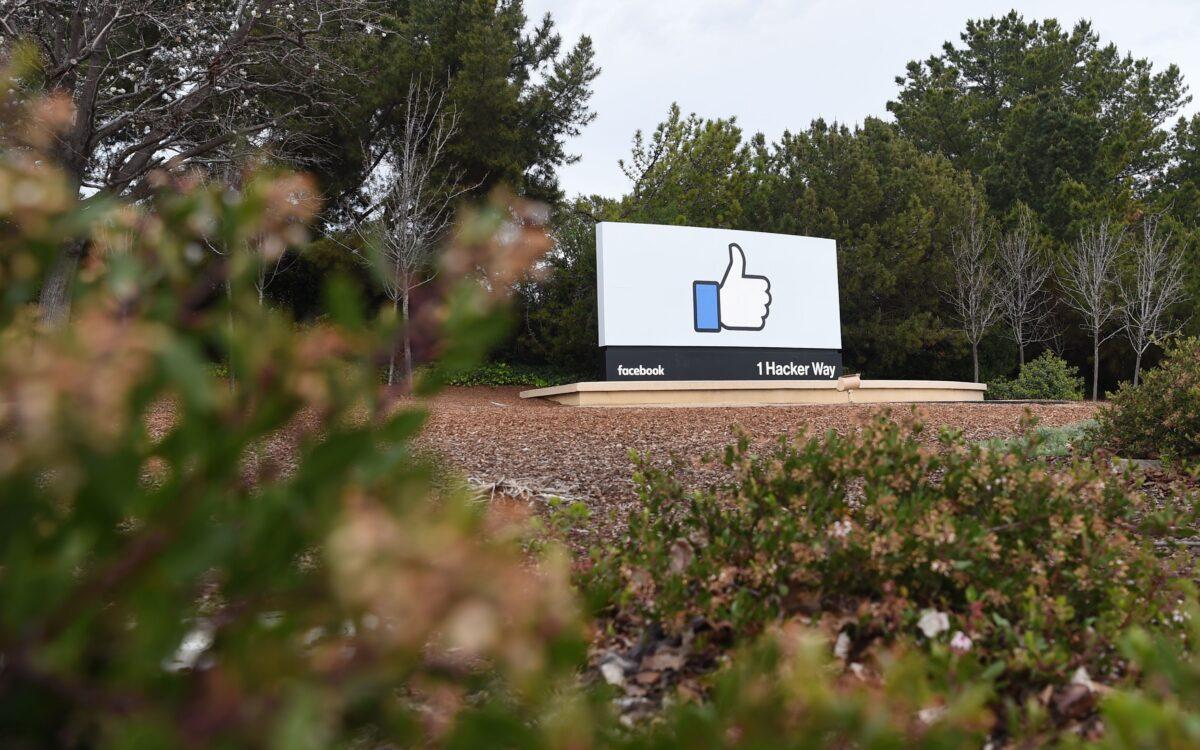 A sign is seen at the entrance to Facebook's corporate headquarters location in Menlo Park, Calif., on March 21, 2018. (Josh Edelson/AFP via Getty Images)