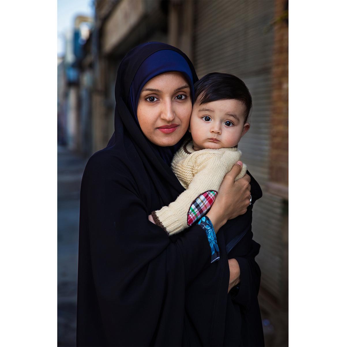 TEHRAN, IRAN, "Leila and her son Abtin" (Courtesy of <a href="https://theatlasofbeauty.com/">Mihaela Noroc</a>)