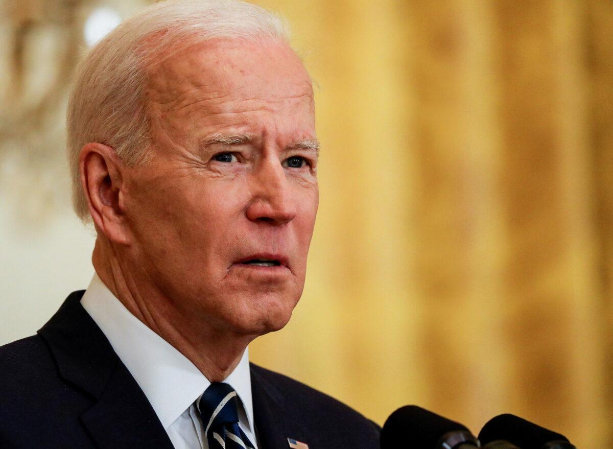 President Joe Biden speaks to reporters as he holds his first formal news conference in the East Room of the White House on March 25, 2021. (Leah Millis/Reuters)