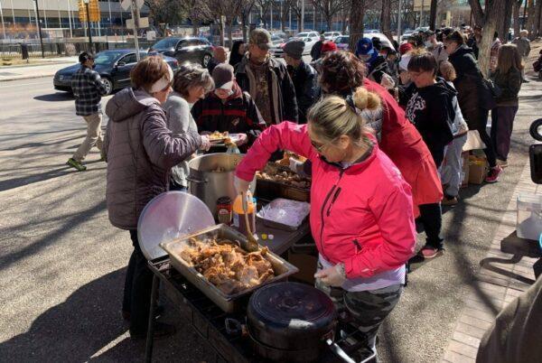 Artur Pawlowski’s Street Church service provides food for the poor at Olympic Plaza in Calgary, in March 2021. (Courtesy of Artur Pawlowski)