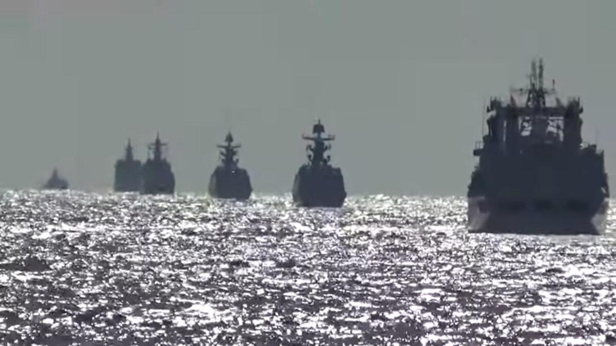 A group of naval vessels from Russia and China conduct a joint maritime military patrol in the waters of the Pacific Ocean, in this still image taken from a video released on Oct. 23, 2021. (Russian Defence Ministry/Handout via Reuters)