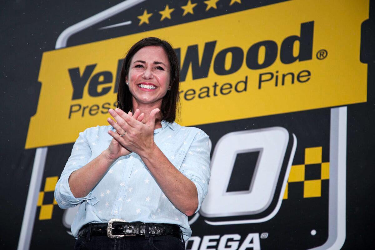 Alabama Republican Senate candidate and honorary starter, Katie Britt is introduced on stage during pre-race ceremonies prior to the NASCAR Cup Series YellaWood 500 at Talladega Superspeedway in Alabama on Oct. 3, 2021. (Sean Gardner/Getty Images)