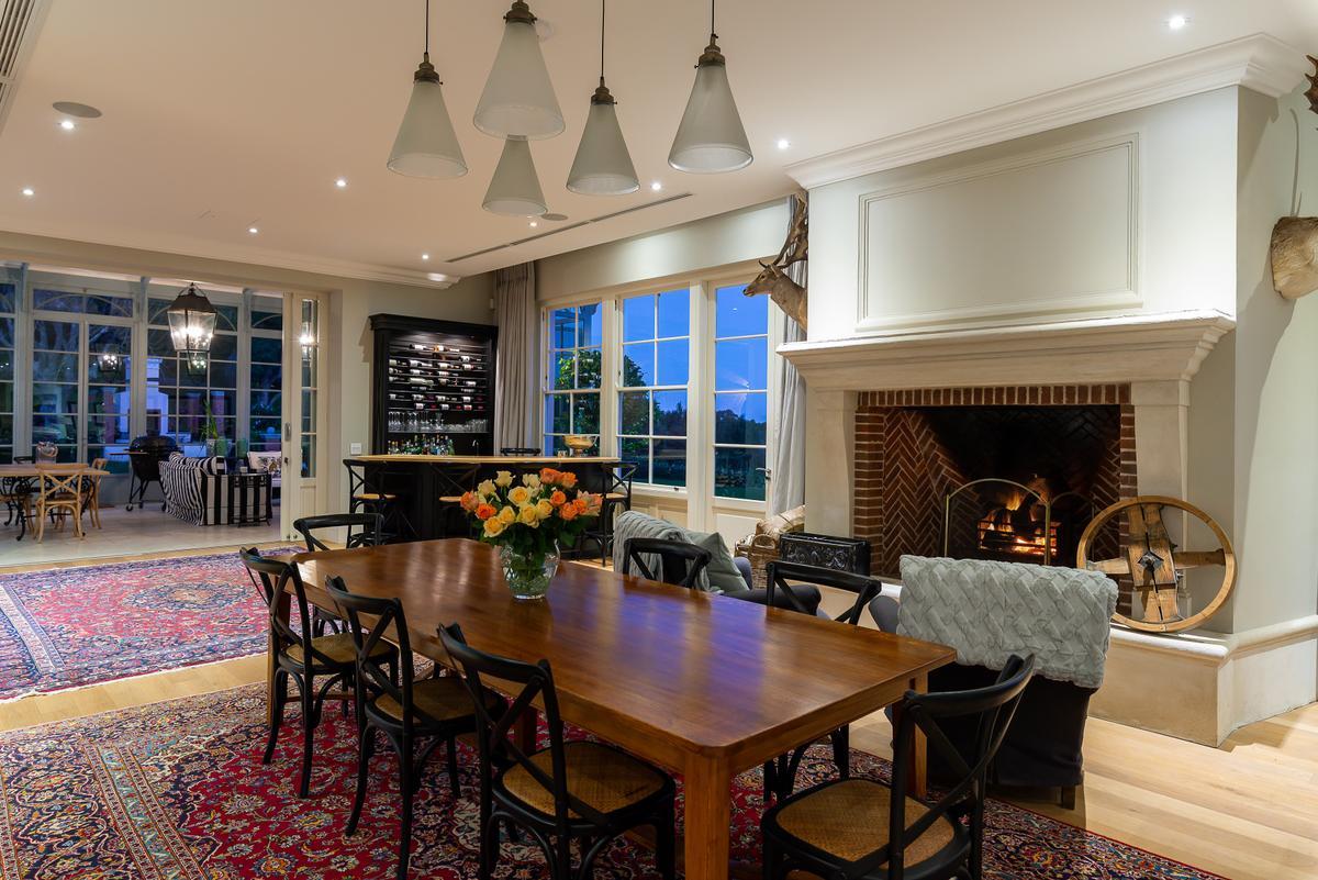 Designed with easy living and entertaining in mind, the home has vast greeting spaces decked out in warm, comfortable furnishings. (Greef Christie’s International Real Estate)