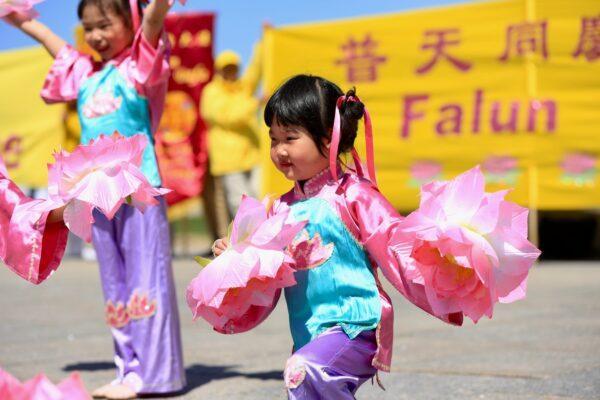 Children put on a performance as Falun Dafa adherents celebrate the 30th anniversary of the spread of the spiritual practice, in Ottawa on May 10, 2022. (Jonathan Ren/The Epoch Times)