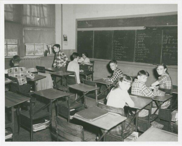 This 1951 photograph shows a classroom in Worsham High School, a school for white students. It was used as Plaintiff's Exhibit No. 22, one of several photographs entered by the plaintiffs to demonstrate unequal facilities in the landmark civil rights case Dorothy E. Davis v. County School Board of Prince Edward County. (National Archives)