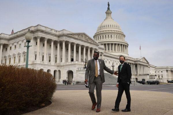 Rep. Burgess Owens (R-Utah) and Rep. John Curtis (R-Utah) arrive for a news conference outside the Capitol on March 17, 2021 in Washington, DC. (Photo by Chip Somodevilla/Getty Images)