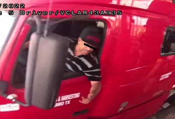 The alleged driver of a truck carrying dozens of illegal immigrants, identified by Mexican immigration officials as "Homero N", drives through a security checkpoint in this surveillance photograph in Laredo, Texas, on June 29, 2022. (National Institute of Migration/Handout via Reuters)
