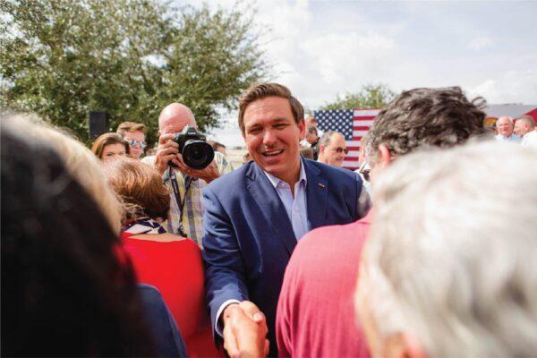 Fla. Gov. Ron DeSantis shakes hands with supporters of his reelection campaign in an undated photo. (Courtesy of Ron DeSantis for Governor)