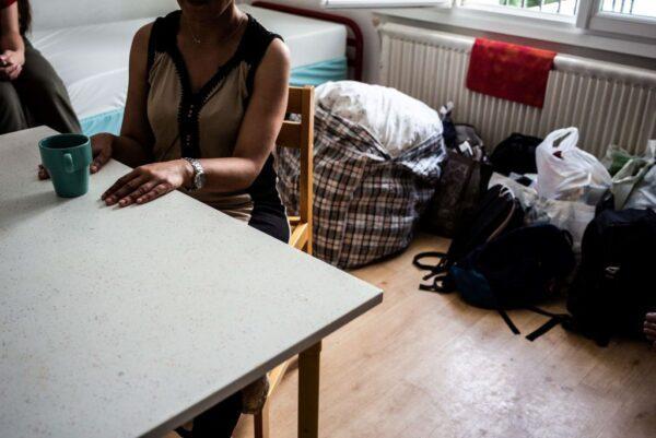 A woman is pictured in the centre d'hebergement et de reinsertion sociale, a shelter dedicated to women, victims of domestic violence, in Chatillon, south of Paris, on Aug. 7, 2019. (Martin Bureau/AFP via Getty Images)