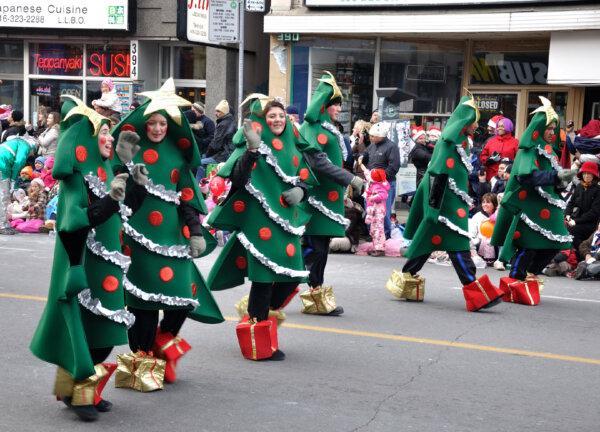 Festive merrymakers in Toronto welcome the holidays with the annual Santa Claus Parade. (Hui Wang/Dreamstime)