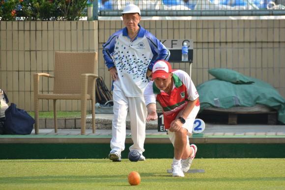 Chadwick Chen (delivering) of Kowloon Cricket Club lost to Wagner Chan of Hong Kong Football Club B team but despite the loss, KCC still managed a 2-6 overall victory and maintain their push for the title. (Stephanie Worth)