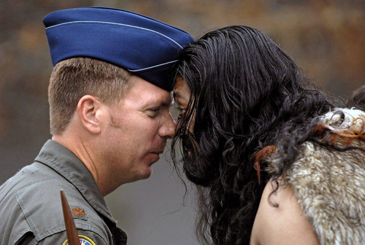 Maj. Bill Eberhardt touches noses (hongi) with a Maori warrior during a powhiri, or welcoming ceremony, in Christchurch, New Zealand. U.S. Air Force photo. (Public domain)