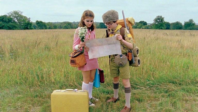 Suzy (Kara Hayward) and Sam (Jared Gilman) meet in a field to go camping together, in "Moonrise Kingdom." (Focus Features)
