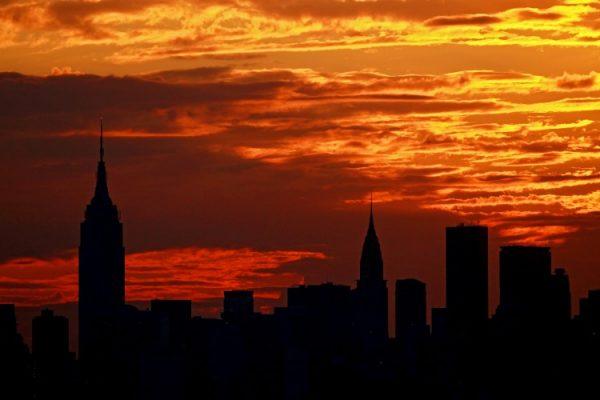 Although the city may never sleep, the sun still sets each night and for optimal health, we should start settling down as the sun is setting as well. (Nick Laham/Getty Images)