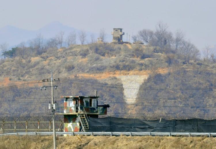 Military guard posts of South Korea (bottom) and North Korea (top) stand opposite each other as seen from in the border city of Paju on March 27, 2013. (Jung Yeon Je/AFP/Getty Images)