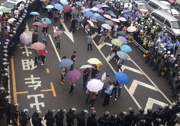 Chinese Workers Protest Over Unpaid Wages
