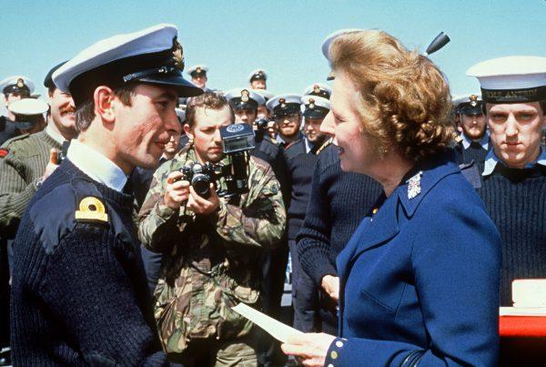 British Prime Minister Margaret Thatcher meets personnel aboard the HMS Antrim during her five-day visit to the Falkland Islands, on Jan. 8, 1983. (Sven Nackstrand/AFP/Getty Images)