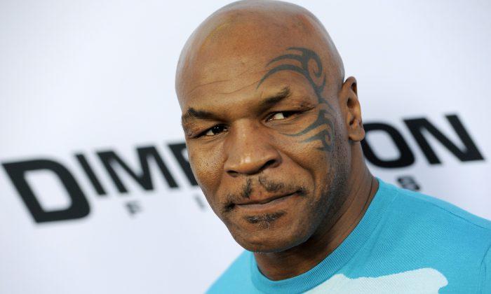 Mike Tyson Helps Injured Motorcyclist on a Highway